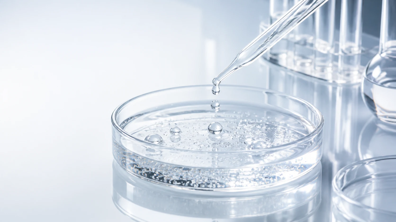 Conceptual glass petri dish and pipette, not an actual test photograph
